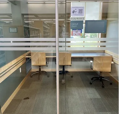 study room with 2 chairs and long counter-style workspace