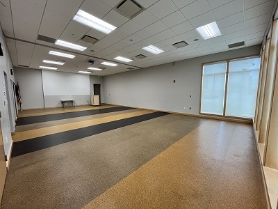large multipurpose room with large corner windows