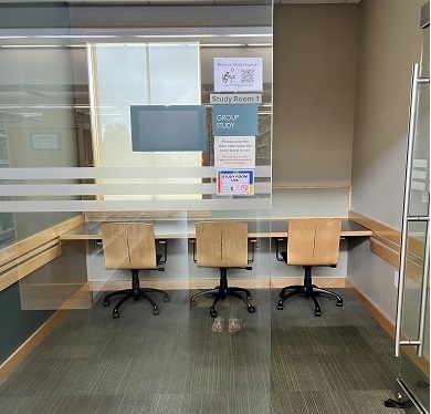 study room with 2 chairs and long counter-style workspace